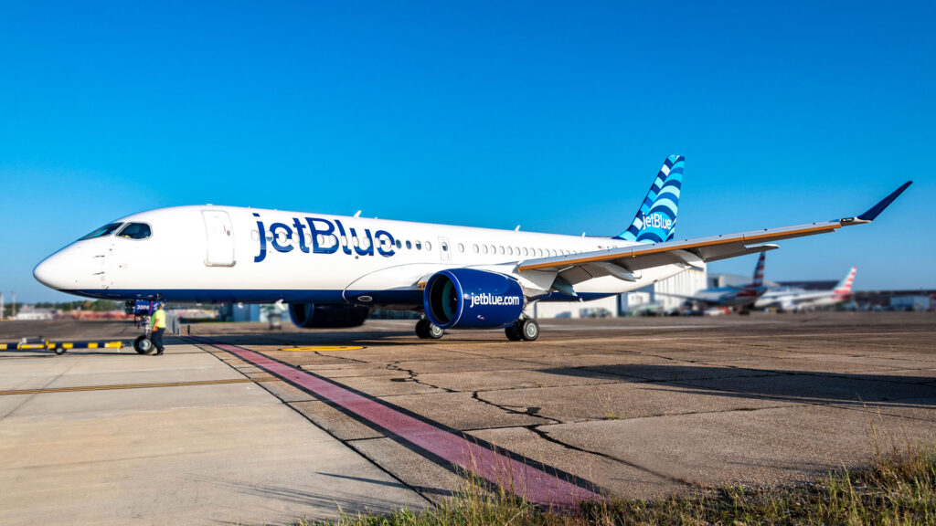 A JetBlue Airbus A220 rests on a taxiway in this undated promotional image from JetBlue.