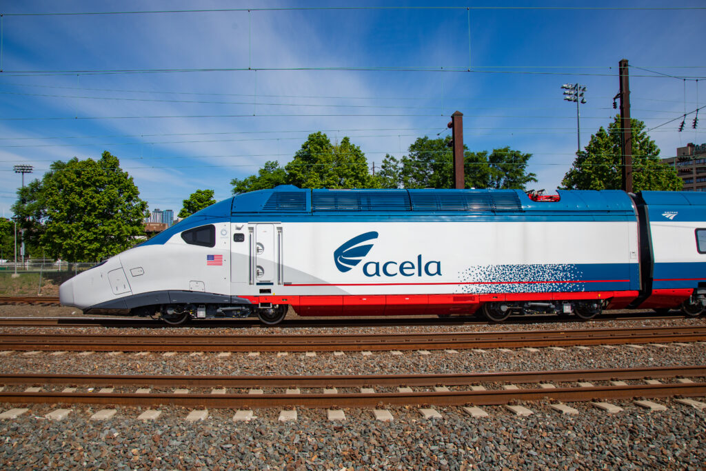 Exterior image of an Amtrak NextGen Acela train operating in the Northeast Corridor. (Amtrak)