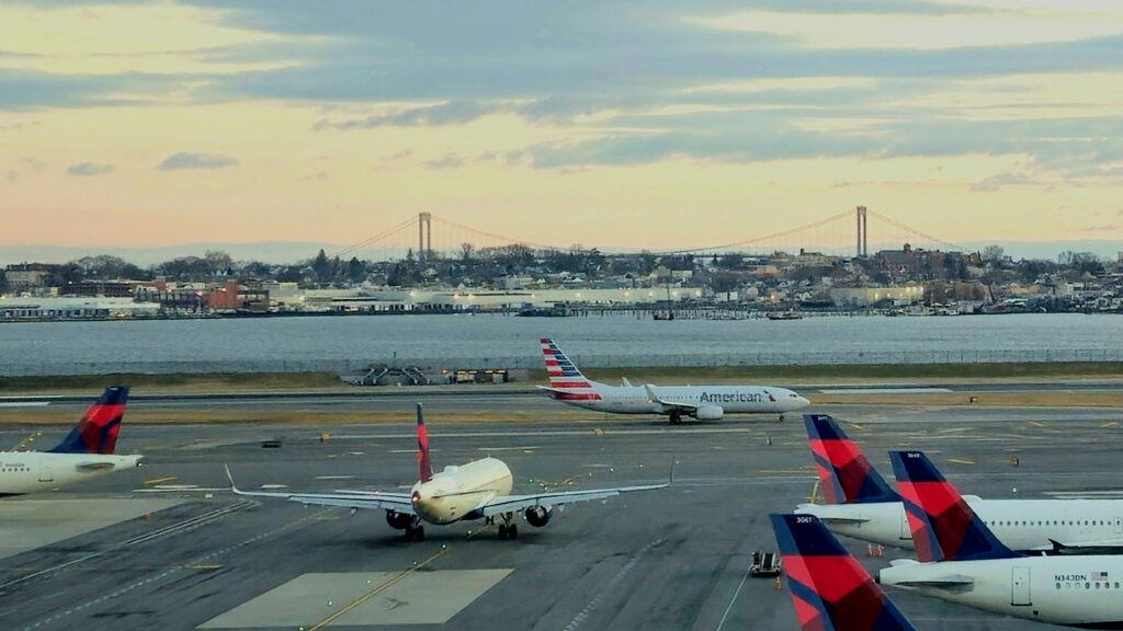 American Airlines planes taxi at LaGuardia Airport in Queens, New York. (Courtesy: Unsplash)