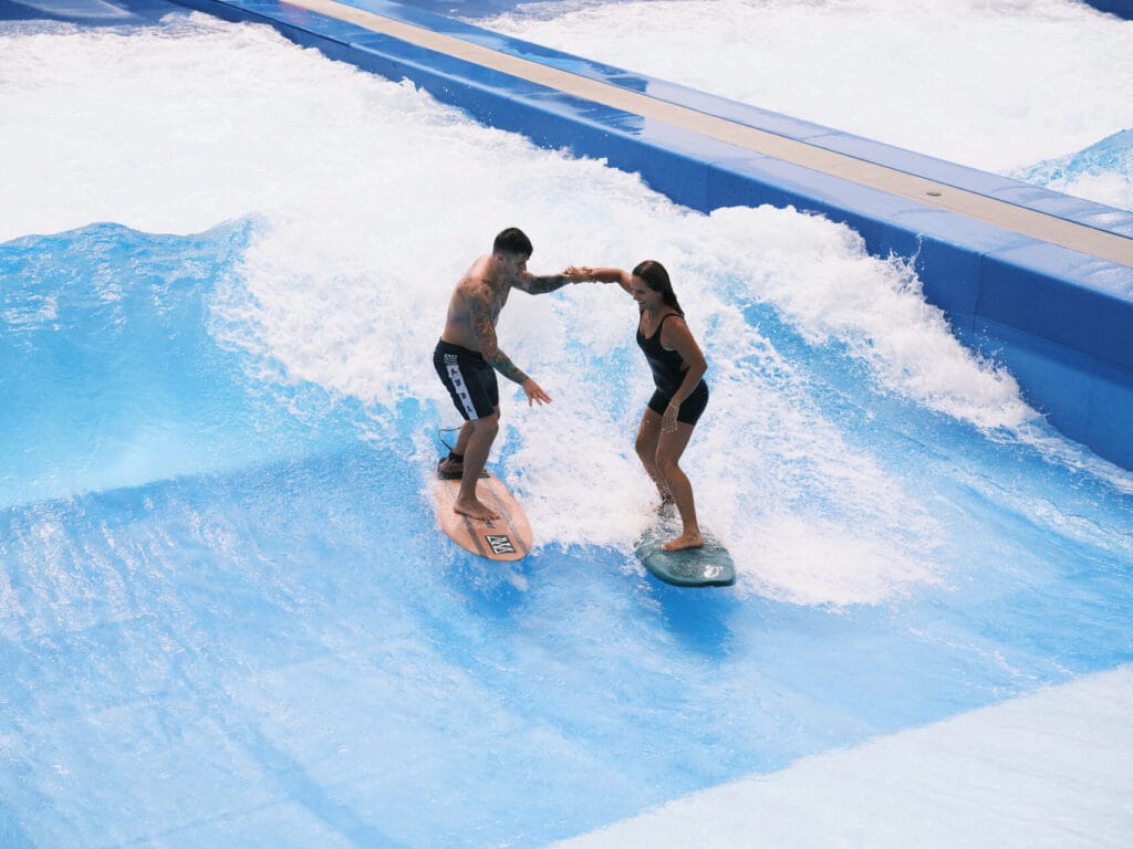 This promotional image shows a private surf instruction as part of a special package at Four Seasons Resort Oahu at Ko Olina. (Courtesy Image)