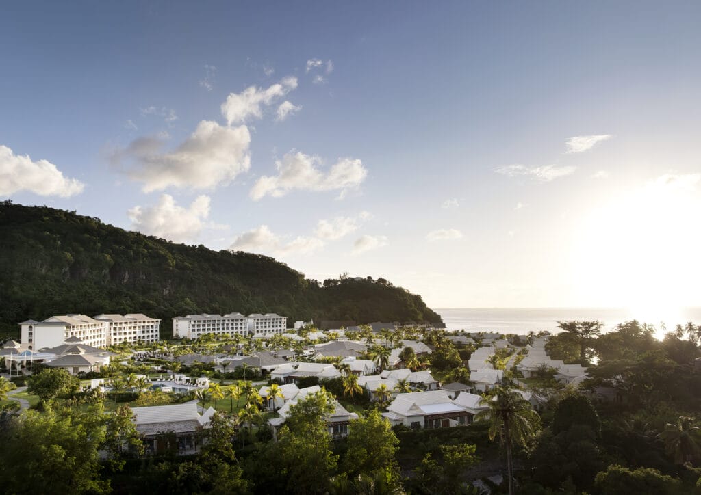 An aerial view of Sandals Saint Vincent and the Grenadines, where lush rainforest meets Caribbean waters, offering adults an immersive all-inclusive escape. (Sandals Resorts)