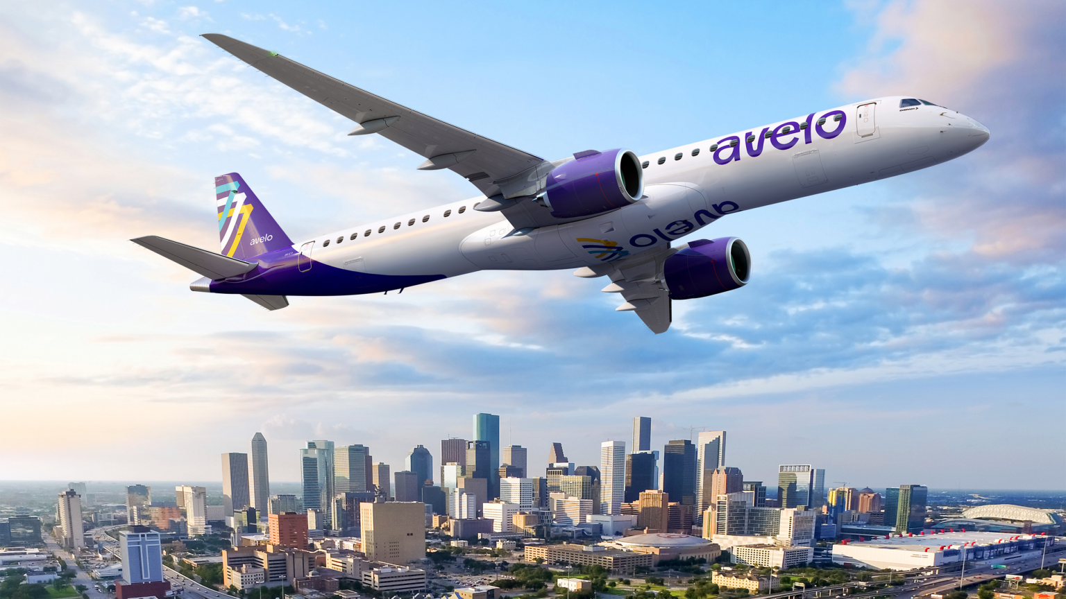 This promotional image from Avelo Airlines shows a rendering of an Avelo jet flying over a city. (Avelo Airlines)