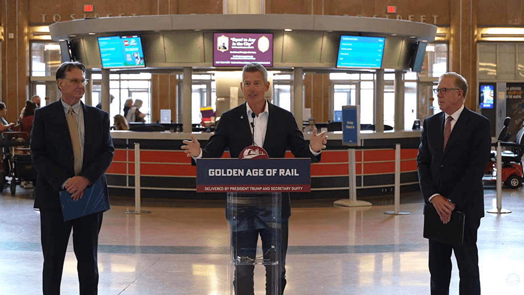 Transportation Secretary Sean Duffy speaks during a news conference announcing the awarding of millions for infrastructure improvements across the Midwest in this photo from August 2026. (Amtrak/Federal Railroad Administration)