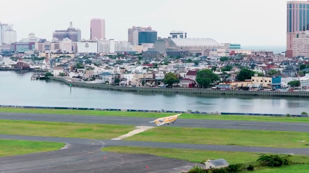 Screenshots from an FAA promotional video shows an Electra hybrid-electric plane take off near Philadelphia as part of an FAA-backed demonstration. (Federal Aviation Administration)