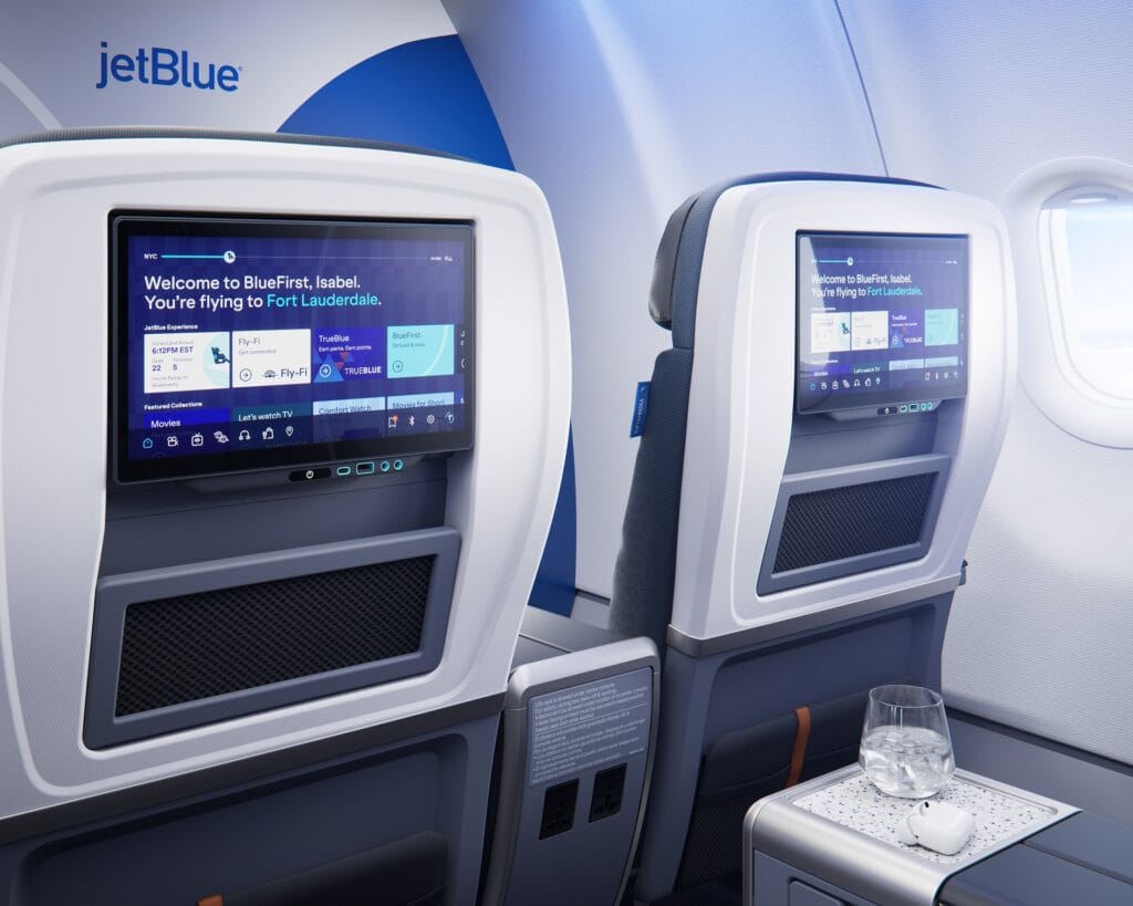 This promotional image from JetBlue shows the seatback entertainment system in the new BlueFirst section.