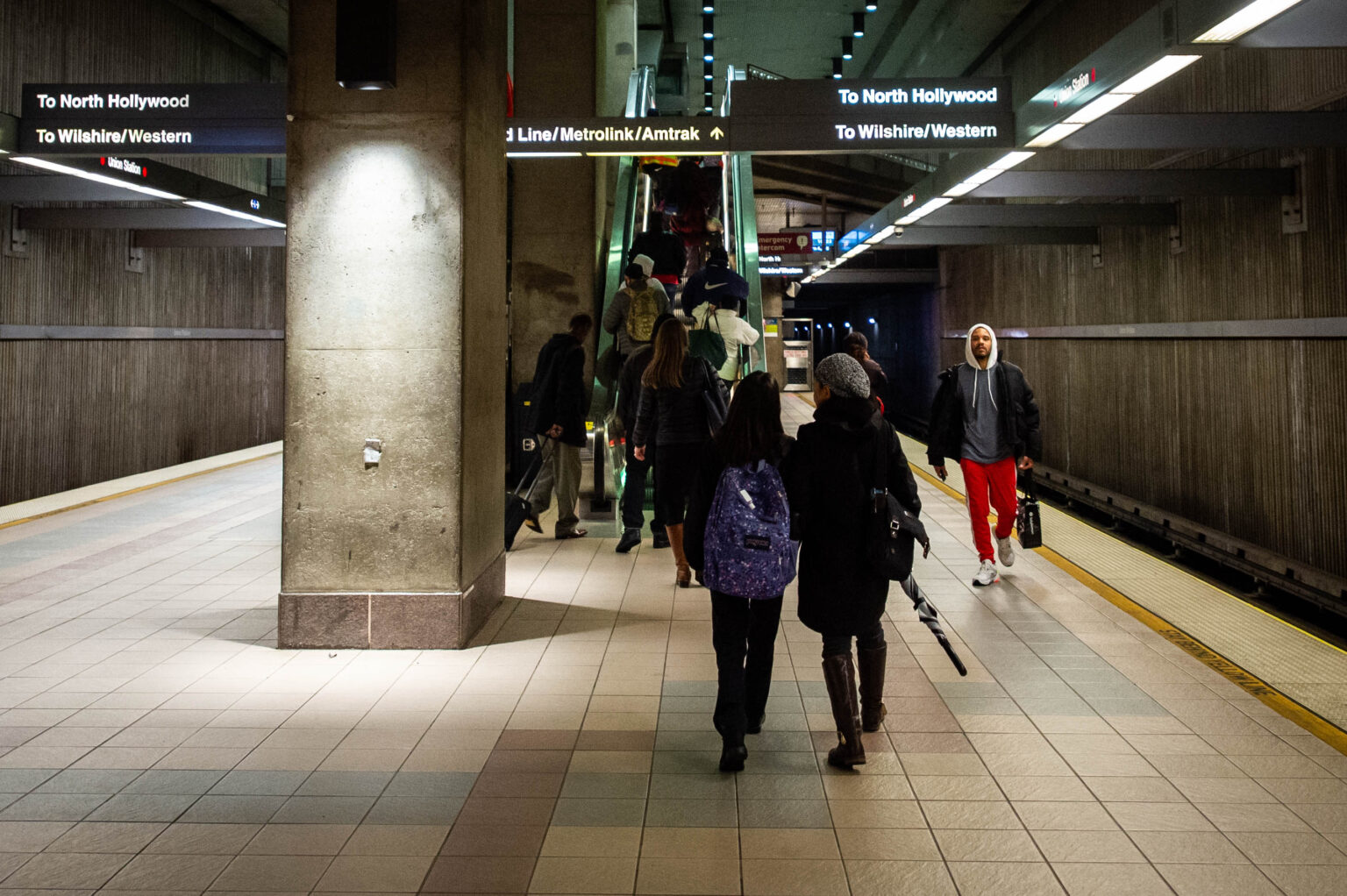 Riders wait for a subway train to arrive at an underground platform at Los Angeles Union Station in this undated promotional image by LA Metro.