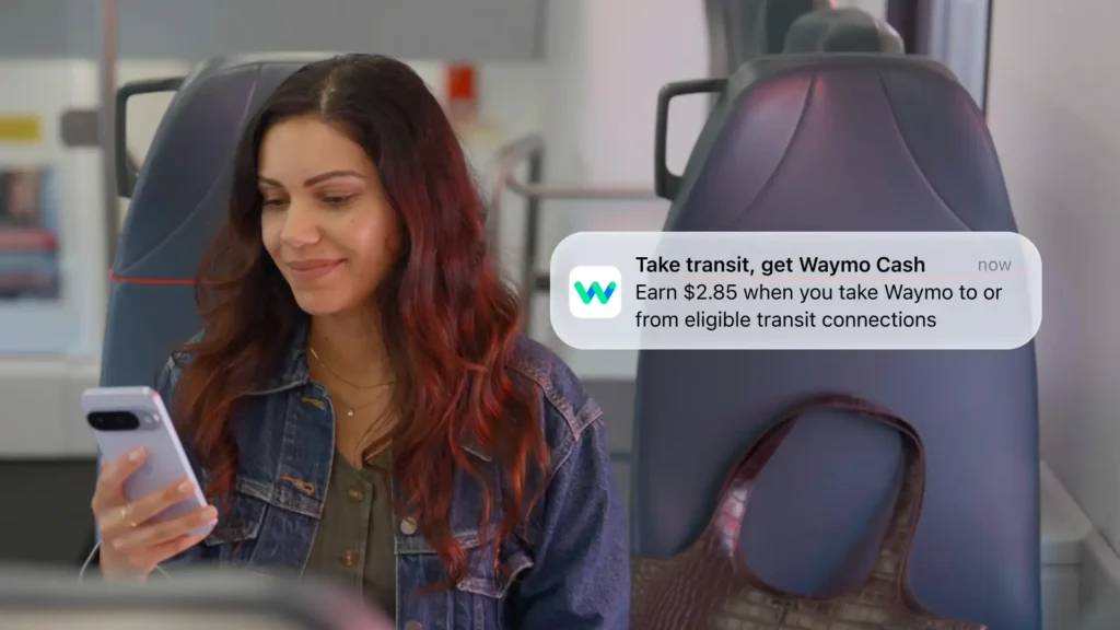 This promotional image from Waymo shows a pop-up screen promoting the Waymo Cash reward program for taking public transit.